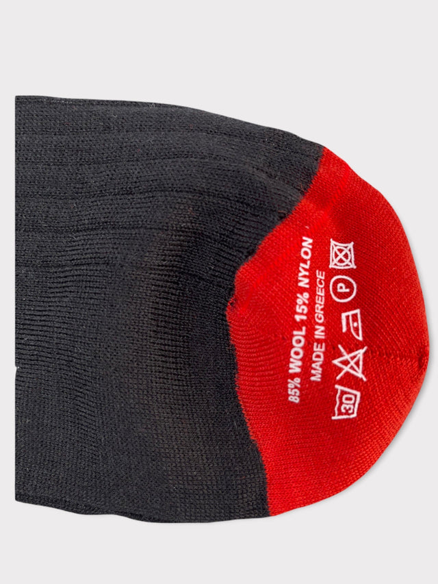 Lange Socken aus schwarzer Wolle